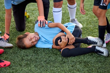 Little,Caucasian,Boy,Fell,To,His,Knee,,Ache,In,Joints